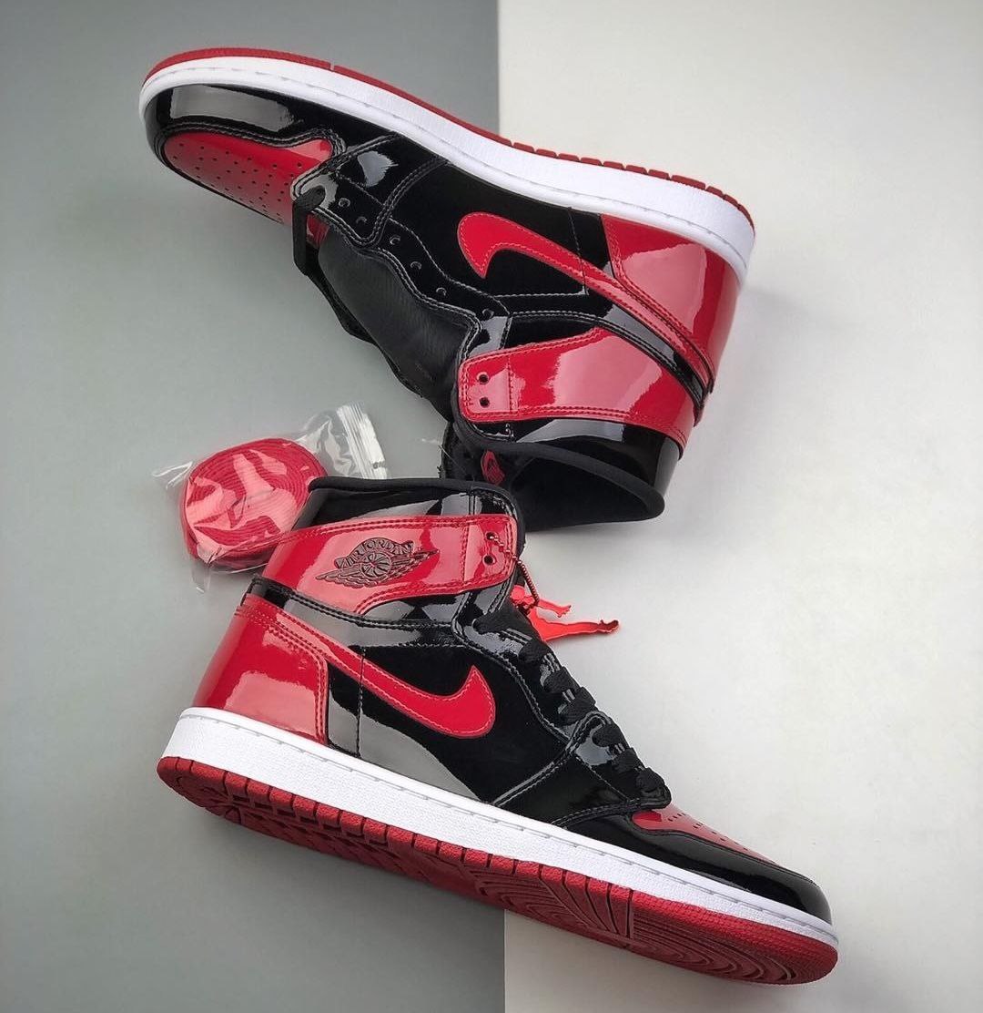 کتونی نایک ایر جردن وان رترو ورنی قرمز مشکی زنانه کتونی نایک ایر جردن وان رترو زنانه