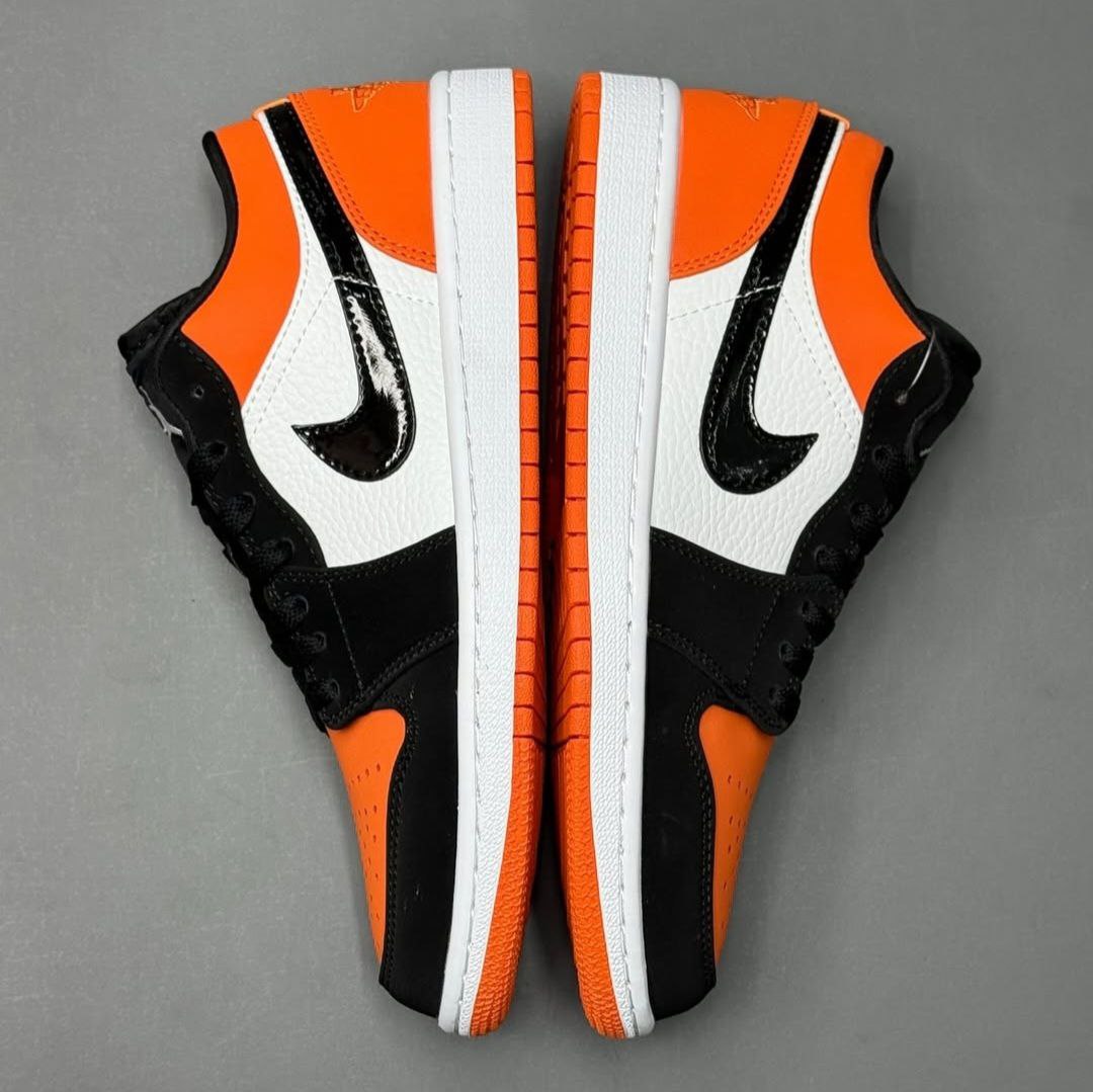 کتونی نایک ایر جردن وان لو بدون ساق نارنجی مشکی زنانه کتونی نایک ایر جردن وان لو بدون ساق شترد بک برد نارنجی مشکی زنانه