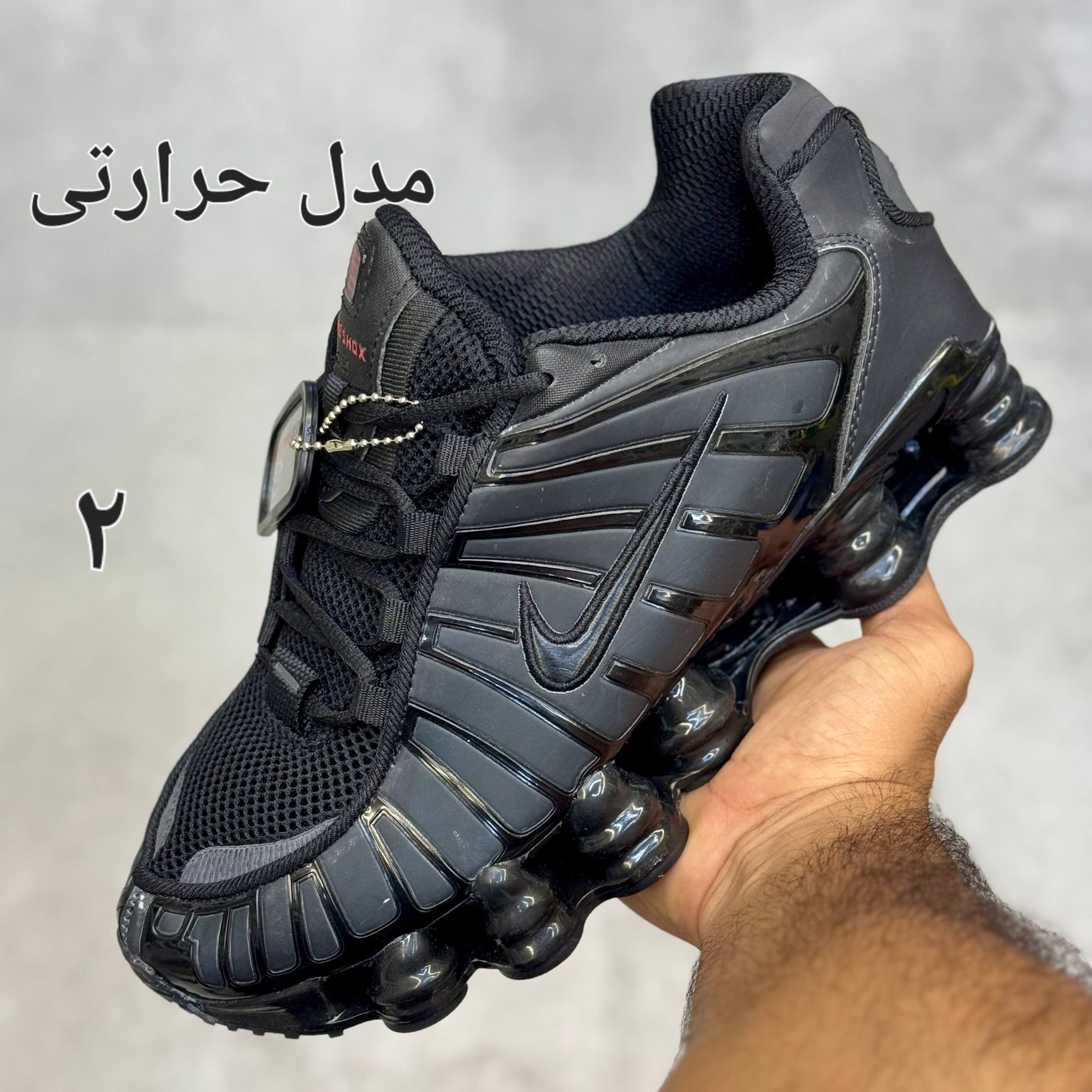 کفش نایک مردانه مدل شاکس تی ال رنگ حرارتی کفش نایک مردانه مدل شاکس تی ال رنگ حرارتی