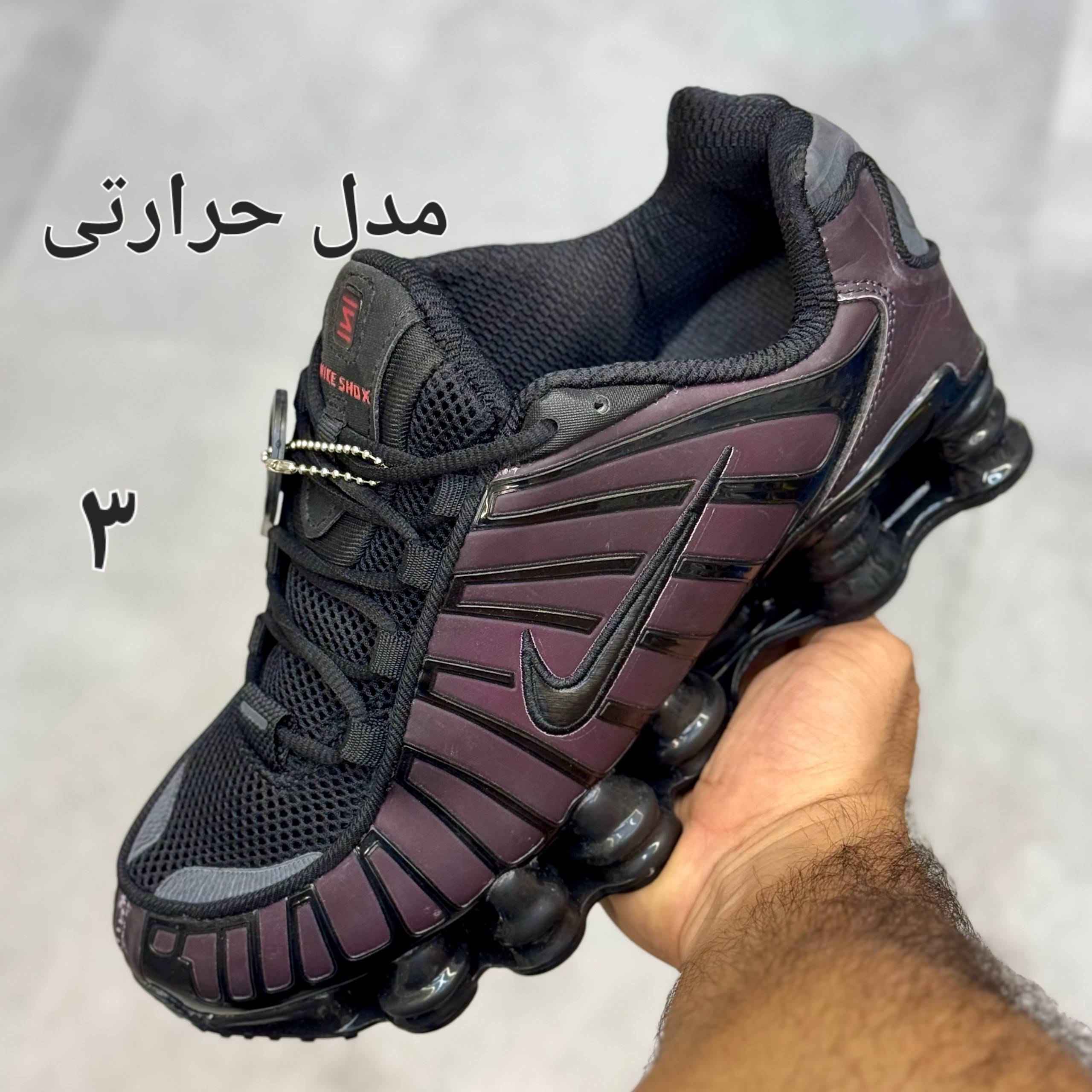 کفش نایک مردانه مدل شاکس تی ال رنگ حرارتی کفش نایک مردانه مدل شاکس تی ال رنگ حرارتی