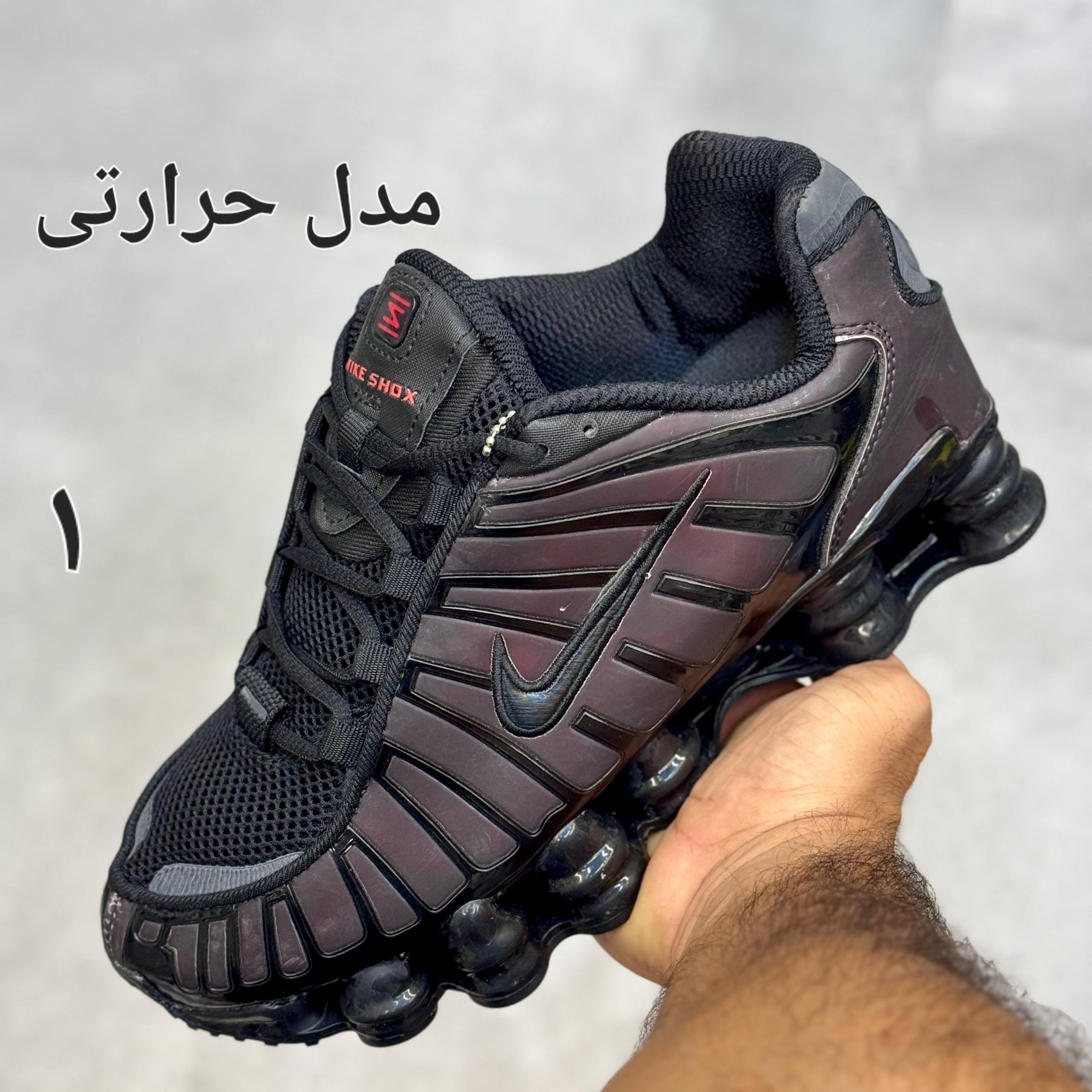 کفش نایک مردانه مدل شاکس تی ال رنگ حرارتی کفش نایک مردانه مدل شاکس تی ال رنگ حرارتی