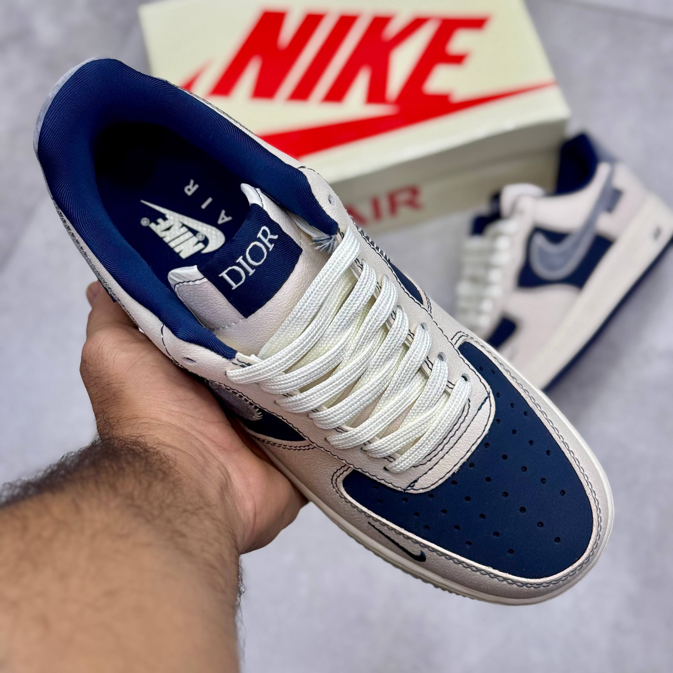 کفش نایک مردانه مدل ایرفورس وان دیور رنگ سرمهای سفید استخوانی کفش نایک مردانه مدل ایرفورس وان دیور رنگ سرمهای سفید استخوانی